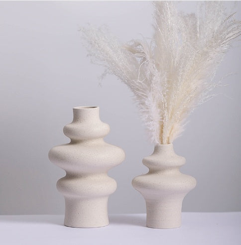 Two modern ceramic vases styled with pampas grass for neutral home décor, vases by Lunari Haus.